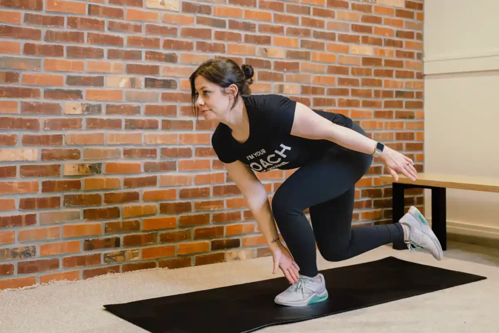 Tone Your Arms in Just One Week: Achieve Results Without the Gym! 1 A person exercising their arms at home with light weights Doncaster