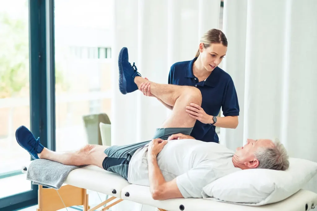 Revitalising Recovery: Effective Rehabilitation Strategies for Muscle Injuries 3 Physiotherapist assisting a patient with muscle recovery exercises Doncaster