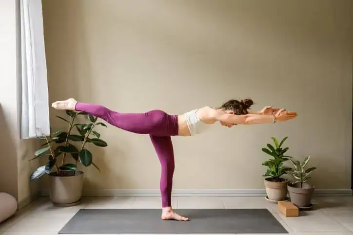 Achieving the Perfect Tone: How Often Should You Exercise for Results? 1 Woman doing Yoga exercise Doncaster to help with toning the body.