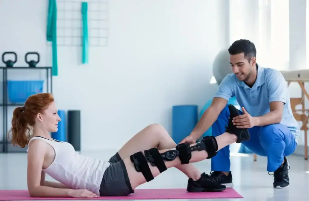Woman having treatment to help muscle recovery Doncaster after an injury